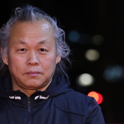 South Korean director Kim Ki-duk on the red carpet for his film Human, Space, Time and Human at the 68th annual Berlin International Film Festival. Photo: EPA