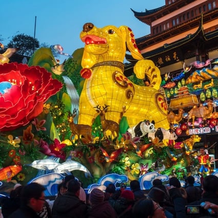 Chinese employees are awarded the least year-end bonuses in three years since 2015, just before the Year of the Dog begins. Photo: AFP