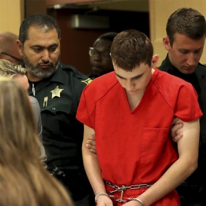 Nikolas Cruz appears in court for a status hearing before Broward Circuit Judge Elizabeth Scherer Monday, Feb. 19, 2018, in Fort Lauderdale, Fla. Cruz is facing 17 charges of premeditated murder in the mass shooting at Marjory Stoneman Douglas High School in Parkland, Fla. (Mike Stocker/South Florida Sun-Sentinel via AP, Pool)