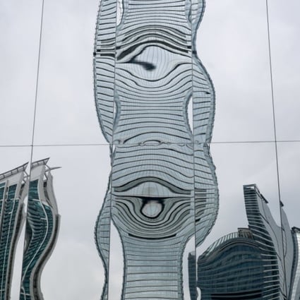 The International Commerce Centre reflected in M+ Pavilion at West Kowloon Cultural District. Picture: Sam Tsang
