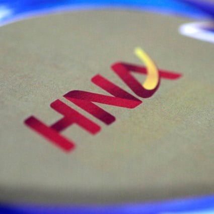 HNA Group has pledged shares in its Hong Kong-listed subsidiary to raise funds. Photo: Reuters