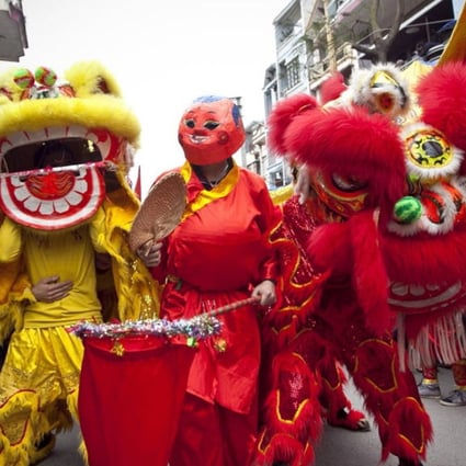 Dong Ky villagers perform a lion dance on the fourth day of Tet, or the Vietnamese Lunar New Year, in Dong Ky, Bac Ninh province, Vietnam. Picture: Luong Thai Linh