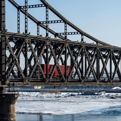 A truck crossing the Friendship Bridge from the North Korean town of Sinuiju to the Chinese border city of Dandong last month. China’s January trade with North Korea fell to the lowest level since at least June 2014. Photo: AFP