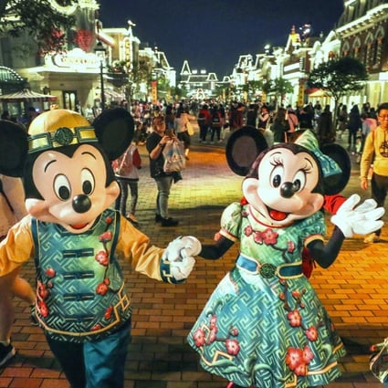 Mickey Mouse and Minnie Mouse dressed in festive Chinese New Year clothes in celebration of Chinese New Year at Hong Kong Disneyland. Photo: Winson Wong