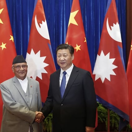 President Xi Jinping and new Nepalese Prime Minister Khadga Prasad Sharma Oli. Photo: AFP