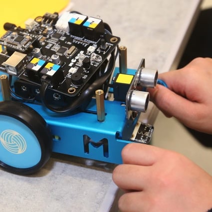 Pupils from Baptist Lui Ming Choi Primary School in Sha Tin attend a class on STEM and robotics in March last year. The school is one of several in Hong Kong to have introduced STEM education for primary school pupils. But apart from maths, no other STEM subject is mandatory in schools. Photo: K. Y. Cheng