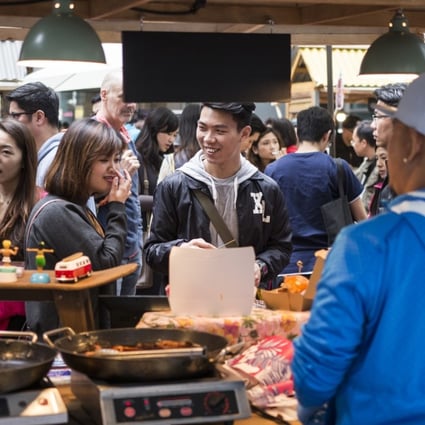 A street market in Quarry Bay. When asked what the city had to offer expats, 36 per cent of Hong Kong respondents cited the quality of food. Photo: Christopher DeWolf