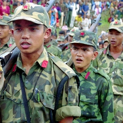 Young Nepalese Maoist rebels take part in a ceremony in May, 2001. Photo: Reuters