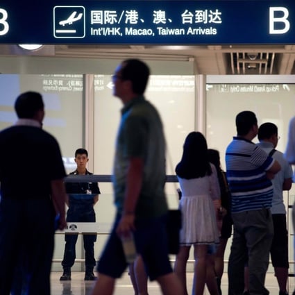 The arrivals area at Beijing Capital International Airport. Some Chinese dual passport holders fear returning to their country of birth. Photo: AFP