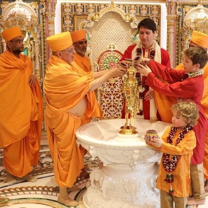 Canadian Prime Minister Justin Trudeau and his sons visit a temple in the Indian town of Gandhinagar. Photo: AFP