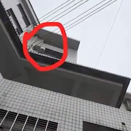 A witness said the four-year-old child was tossed out of a fourth-storey window at a guest house in central China’s Hunan province. Photo: YouTube