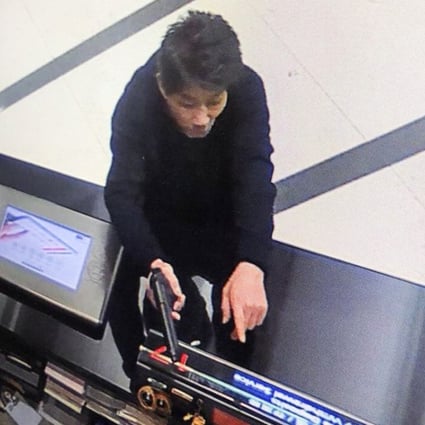 Police are looking for a suspect who robbed The Bank of East Asia headquarters in Central. Photo: Facebook