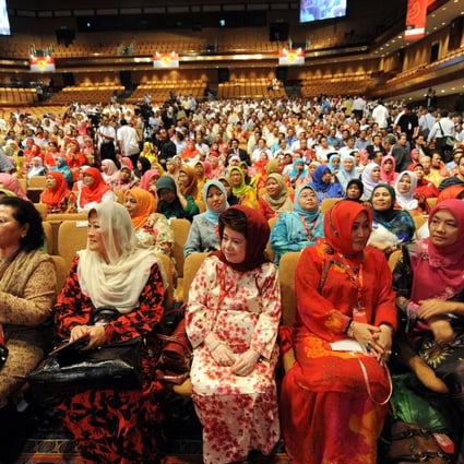 Delegates attend a gathering of Malaysia's ruling United Malays National Organisation. Malaysia has a poor track record when it comes to gender equality. Photo: AFP