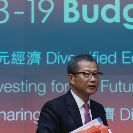 Financial Secretary Paul Chan arrives for a press conference at Tamar on February 28, after delivering the 2018-2019 budget for Hong Kong. Photo: Sam Tsang