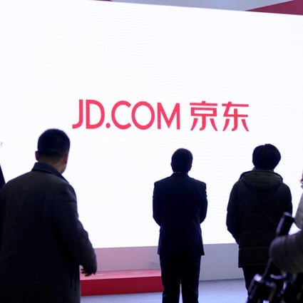 A JD.com sign is seen during the fourth World Internet Conference in Wuzhen, Zhejiang province, in December last year. China’s second largest e-commerce company saw its US-listed shares drop after reporting lower-than-expected quarterly profit on Friday. Photo: Reuters