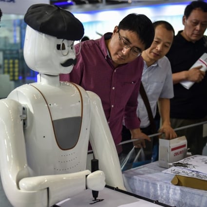 People watch a robot demonstration during the 19th China Hi-tech Fair in Shenzhen,where over 3,000 exhibitors participated and displayed a lot of robot and artificial intelligence projects. Photo: Xinhua