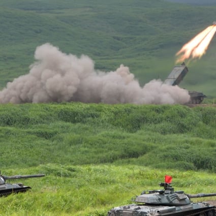 File photo of a Japanese military type-92 anti-mine rocket launcher firing a missile during exercises at the Higashi-Fuji firing range in Gotemba. Photo: AFP