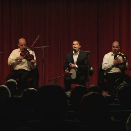 Barakat Jabbour (centre) plays a musician searching for his roots in the Lebanese film Tramontane (category I; Arabic), directed by Vatche Boulghourjian .