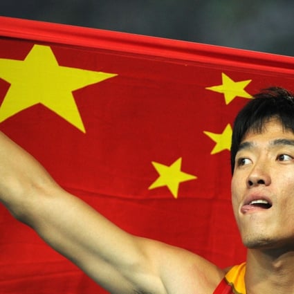 (China's Liu Xiang reacts after competing in the men's 110 metres hurdles final at the 2011 World Championships. Photo: AFP