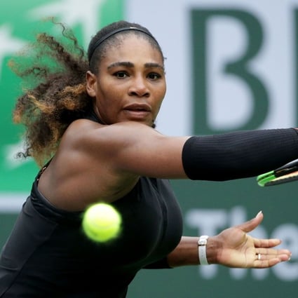 Serena Williams lunges to return a backhand to Kiki Bertens at the BNP Paribas Open. Photo: AFP