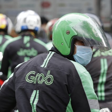 Grab Financial Services Asia, a new joint venture between ride-hailing firm Grab and Japanese credit card company Credit Saison Co, will offer micro-financing products in Southeast Asia. Photo: AP