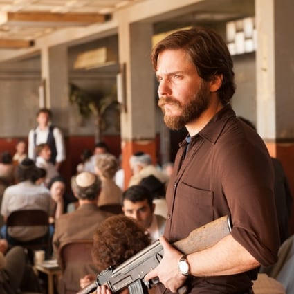 Daniel Brühl in a still from 7 Days in Entebbe (category: IIA), directed by Jose Padilha. Rosamund Pike and Eddie Marsan co-star.