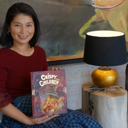 Libby Lam with her book “Crispy Children”. Photo: Sophia Lam/SCMP
