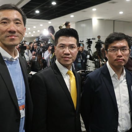 Pan-democrat candidates (left to right) Edward Yiu, Gary Fan, Au Nok-hin and Paul Zimmerman wait for the results of the Legislative Council by-election at the Hong Kong Convention and Exhibition Centre in Wan Chai on March 12. Photo: Sam Tsang