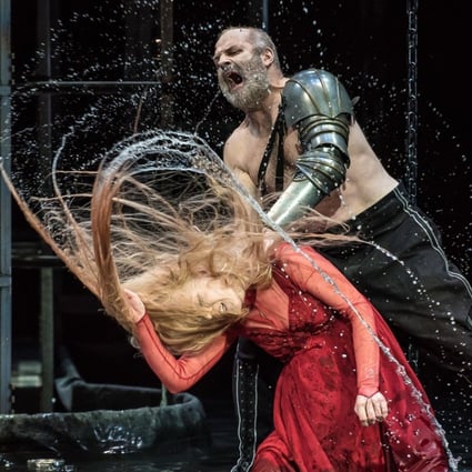 Mélisande (Jurgita Adomonyté) is flung by the hair by Golaud (Christopher Purves) in a terrifying scene from the Welsh National Opera’s production of Pelléas et Mélisande.