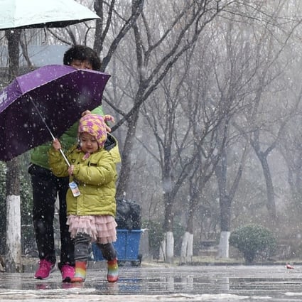 Most parts of Beijing received an average of up to 2 millimetres of sleet and light snow on Saturday morning. Photo: Xinhua