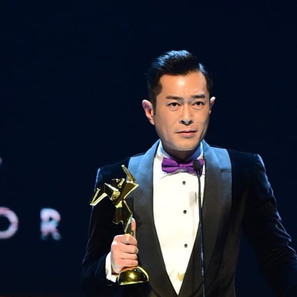 Louis Koo receiving the best actor award at the Asian Film Awards 2018 for his role in Paradox, director by Wilson Yip.