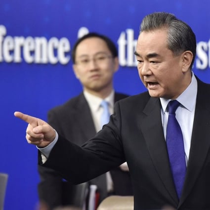 Chinese Foreign Minister Wang Yi answers questions from reporters during a press conference in Beijing earlier this month. Photo: Kyodo