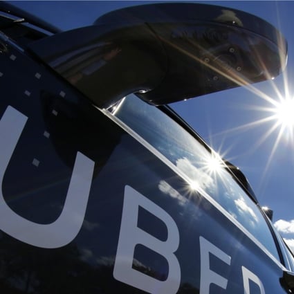 A self-driving Uber sits ready to take journalists for a ride during a media preview in Pittsburgh. Photo: AP