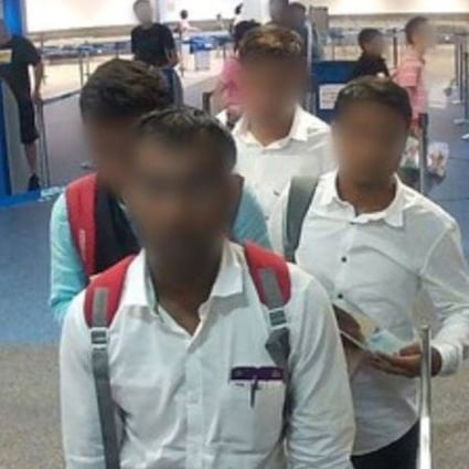 The group of fake reporters arrive at Brisbane Airport on Wednesday holding Temporary Activity Visas, claiming to be accredited media representatives, in this photo provided by the Australian Border Force. Photo: ABF