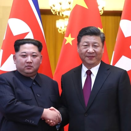 Kim Jong-un (left) pictured with President Xi Jinping during their meeting in Beijing. Photo: Xinhua