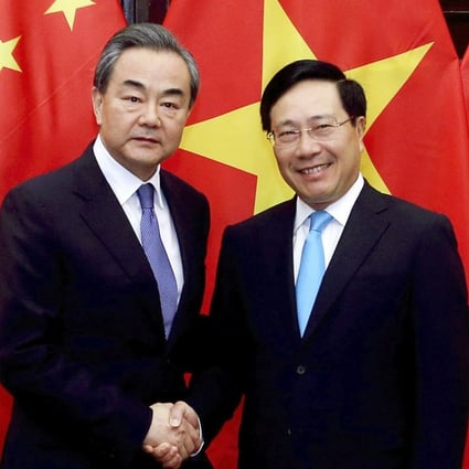 Chinese Foreign Minister Wang Yi (left) and Vietnamese Foreign Minister Pham Binh Minh. Photo: AP