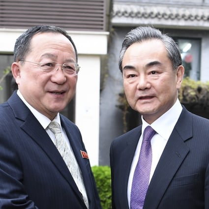 China’s Foreign Minister Wang Yi (right) pictured with his North Korean counterpart, Ri Yong -ho, in Beijing. Photo: Xinhua