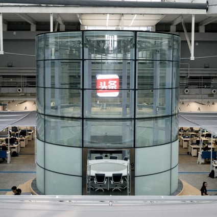 The logo for the Jinri Toutiao mobile app is displayed inside the company's headquarters in Beijing. Photo: Bloomberg