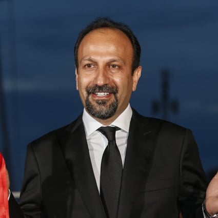 Iranian director Asghar Farhadi after winning the best screenplay award for Forushande (The Salesman) at the 69th Cannes Film Festival in 2016. Photo: EPA-EFE/Julien Warnand