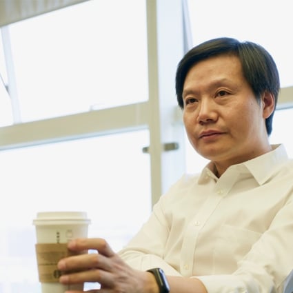 Xiaomi CEO Lei Jun speaks in an interview at the company's Beijing headquarters.