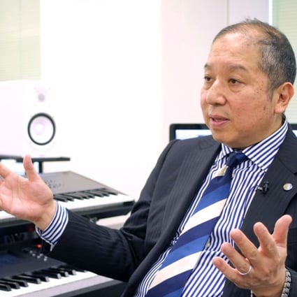 Japanese musician Minoru Mukaiya speaking at his workplace in Tokyo last month. Mukaiya is a composer of ‘hassha merodii’ or train departure melodies, short jingles that whisk commuters on their way at some of the world's busiest stations. Photo: AFP