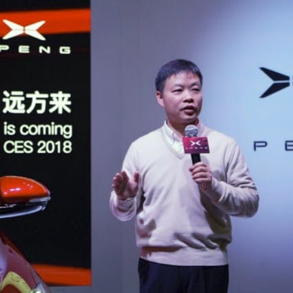 He Xiaopeng, co-founder and chairman of Xiaopeng Motors, unveils the company's first production car at the CES trade show in Las Vegas. Photo: Handout