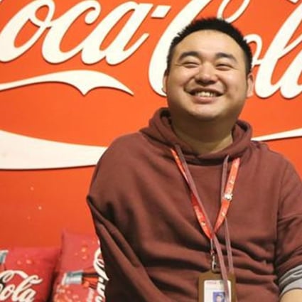 Xue Hao, aka ‘Coke Boy’, now welcomes visitors to the drinks giant’s museum in Chengdu. Photo: 163.com