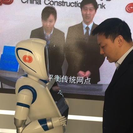 Good morning, sir... a robot capable of voice recognition and briefing visitors on basic services is there to meet customers, at the newly opened, unstaffed China Construction Bank outlet in Shanghai. Photo: Maggie Zhang