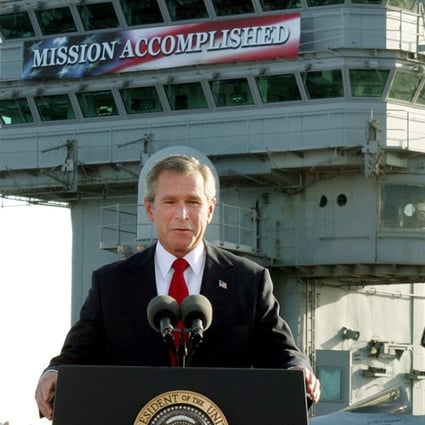 US President George W. Bush declares the end of major combat in Iraq in 2003 as he speaks aboard the aircraft carrier USS Abraham Lincoln. He was wrong. File photo: AP