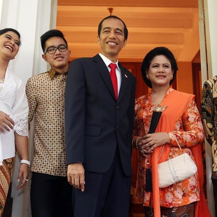 Indonesia's President Joko Widodo and family. With key electoral tests looming, Widodo has little incentive to meddle with what is proving to be a popular healthcare scheme. Photo: AFP