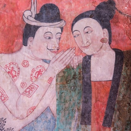 An ancient mural painting of a man whispering to a woman at Wat Phumin, a famous temple in Nan province,Thailand. Buddhists believed sex was originally a product of something negative, namely human craving. Photo: Shutterstock