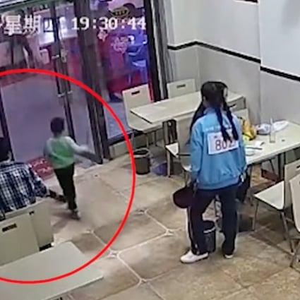 Surveillance footage captures the woman tripping the child. Photo: Thepaper.cn