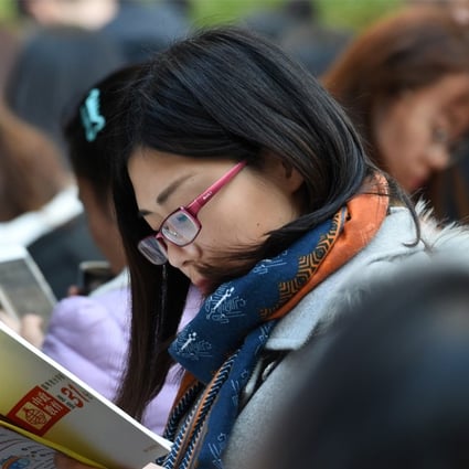 A woman prepares for the National Civil Servant Exam at Nanjing Forestry University in Jiangsu province in December 2017. A Human Rights Watch report found 19 per cent of civil service job postings explicitly stated a preference for men. Photo: Xinhua
