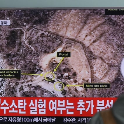 A man in Seoul watches a TV news program reporting a North Korea nuclear test. Photo: AP